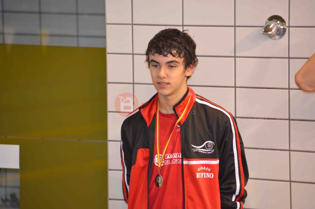 Ivan, recibiendo una de sus 5 medallas